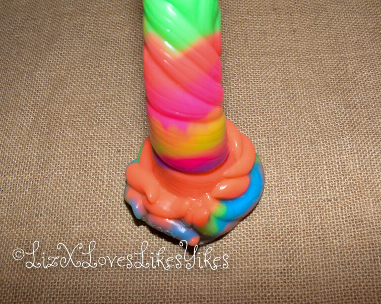 A picture of the base of the toy. Review of the Depth Training Unicorn Tentacle Anal Dildo Luminous BigShocked.com Copyright Liz BlackX